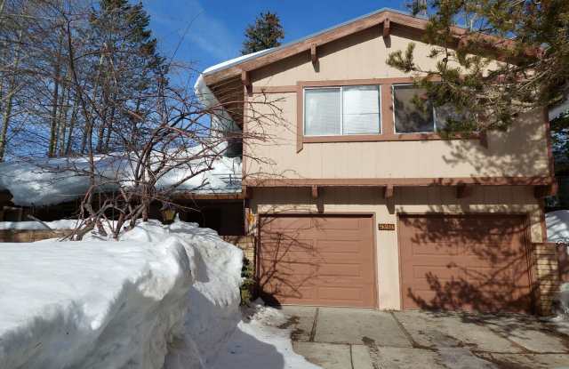 Large furnished 4 bedroom home with 2 car garage