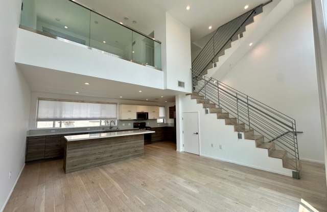 Photo of Modern-Contemporary 2 Bd + Loft Home w/ Private Rooftop Deck + Attached 2-Car Garage