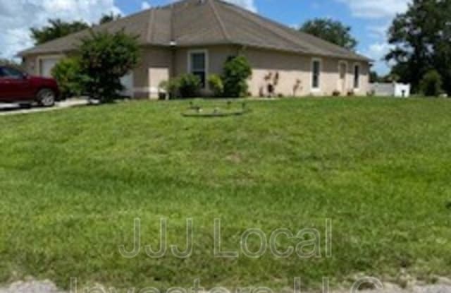 461 Piedmont St - 461 Piedmont Street, Lehigh Acres, FL 33974