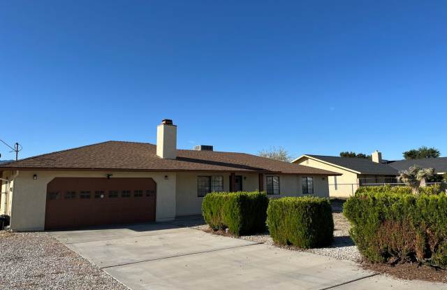 Welcome to this charming 3-bedroom, 2-bathroom home in Hesperia, CA. photos photos