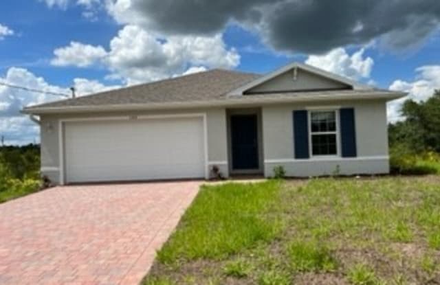 548 Woodview Drive - 548 Woodview Dr, Lehigh Acres, FL 33972