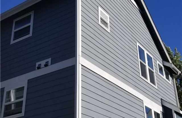 Photo of Spacious 4 Bedroom Townhome with Private Fenced Yard!