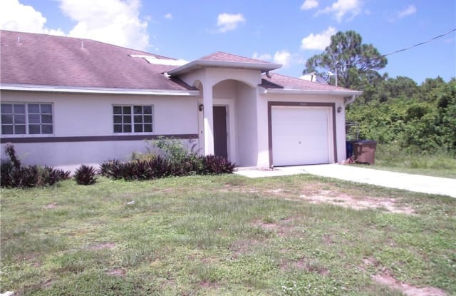 1943 E 12th Street - 1943 East 12th Street, Lehigh Acres, FL 33972