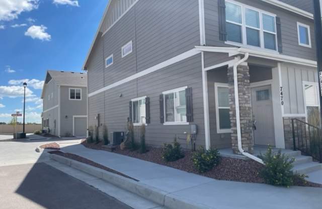 Photo of LIKE NEW 3BD TOWNHOME w/2.5 CAR GARAGE and A/C in NE COL SPGS - Deposit Waiver Available