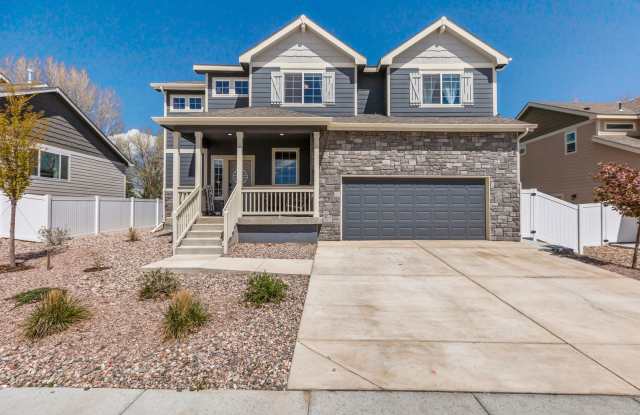 Photo of Spacious 4-Bedroom Home with Private Backyard Oasis and 3-Car Garage