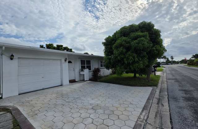 7195 NW 9TH Court