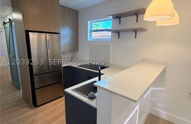 453 NW 25th Ct