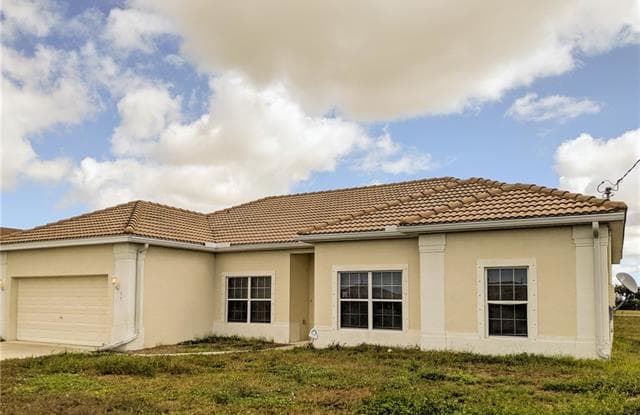 17 NW 32nd PL - 17 Northwest 32nd Place, Cape Coral, FL 33993