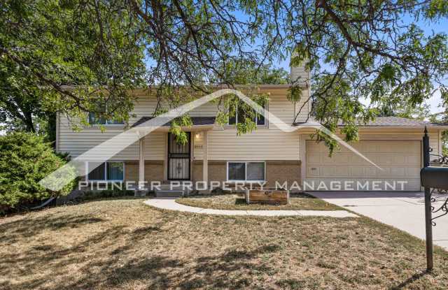 Photo of Lovely Home With Spacious Fenced Back Yard and 2 Car Garage!