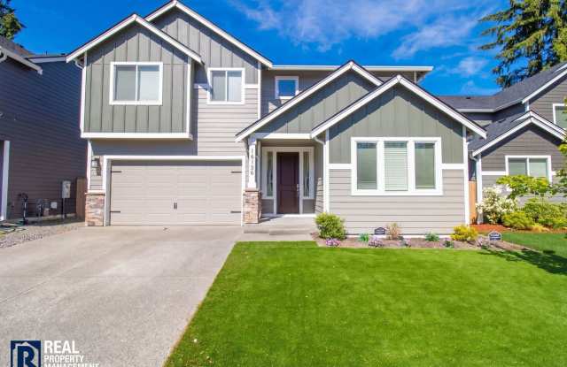 Modern 5-Bedroom Home with Mother-In-Law Suite & Covered Patio!