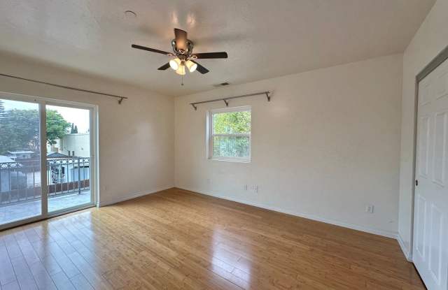 Upstairs 1 Bedroom with tons of Sunshine and Large Balcony!
