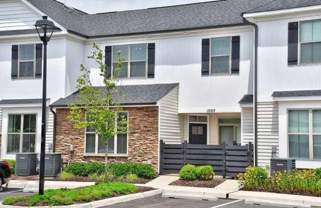 Brick  Bright Living in Villages at Bartlett Station | 3BD, 3BA Townhouse