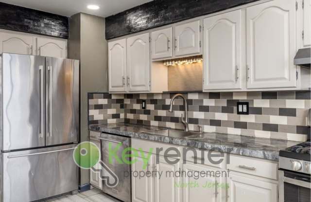 Modern 3-Level Townhome with River Views in Wallington