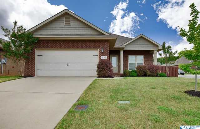 SPACIOUS FOUR BEDROOM BRICK HOME