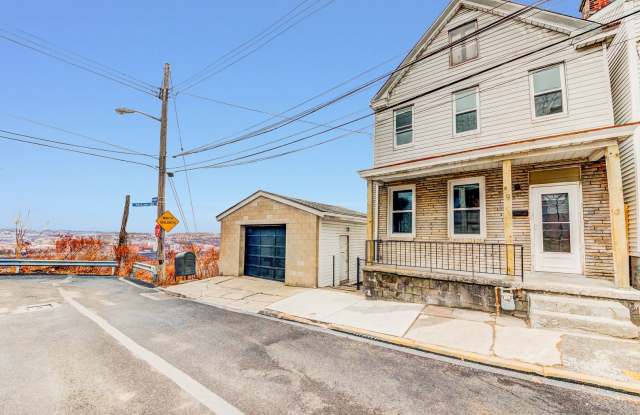 Available August - RENOVATED 3 Bedroom Home w/ Garage, City Views + MORE!