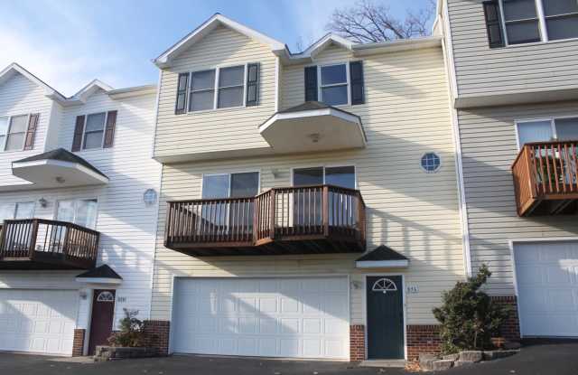 Townhome with a double garage for rent - 876 Camelot