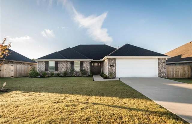 Gorgeous Home with Vaulted Ceilings and Large Fenced Yard! Spacious 3 Bedroom and 2 Bath Home!