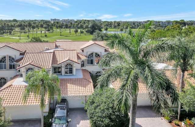 560 W Palm Aire Dr
