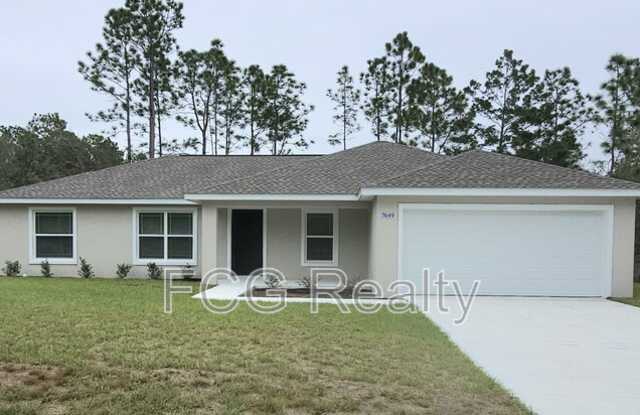 7649 W Normandy Pl