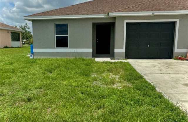 406 Petite Avenue - 406 Petite Avenue, Lehigh Acres, FL 33974