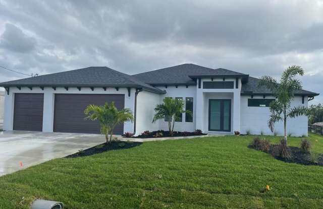 Beautiful new construction Pool House in Cape Coral!3BR+Den+2Bath.Available now! photos photos
