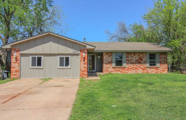 Step into the warmth and charm of this delightful 4-bedroom, 1.5-bathroom haven! - 2437 Southeast 51st Street, Oklahoma City, OK 73129