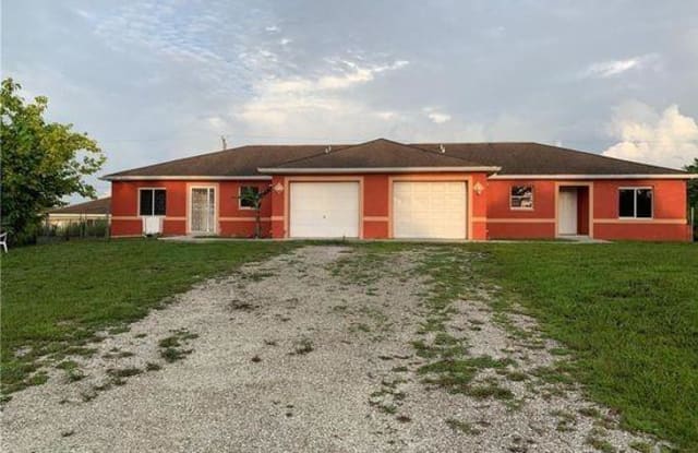 1108 Gretchen AVE S - 1108 1108/1110 Gretchen Ave S, Lehigh Acres, FL 33973