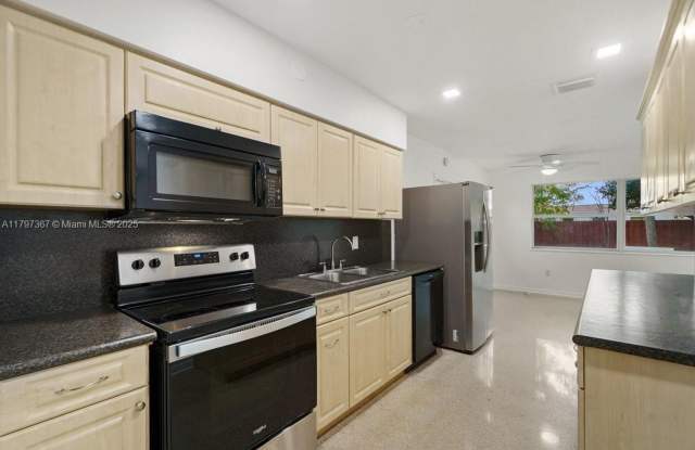 Photo of 50 NE 45th Court 50, Oakland Park, FL 33334