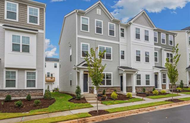 Photo of **FIRST MONTH FREE** Available Now! New Construction - 3 Bedroom, 2.5 Bath Townhouse