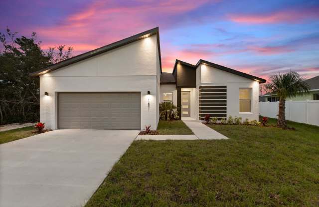 Newly built! Modern, energy efficient home with ALL of the upgrades! - 127 Maple Drive, Poinciana, FL 34759