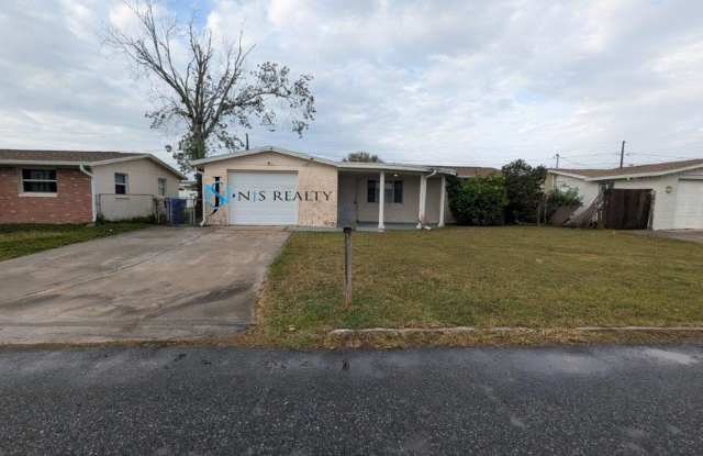 JUST REDUCED!!! Beautiful updated 3/1.5/1 with large renovated kitchen, spacious open floorplan, oversize garage, fenced yard and more...