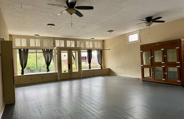 Rare opportunity to lease a versatile mixed-use property in the heart of Milwaukie!