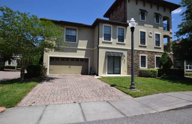 Beautiful 5 bedrooms/ 5 baths, 3 story Townhome with a 2 car garage for rent at 1339 Shinnecock Hills Dr. Davenport, FL 33896. photos photos