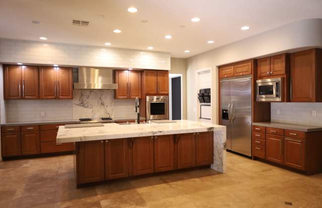 Fully Upgraded 5 Bedroom 4.5 Bathroom in Guard Gated Foothills Community!