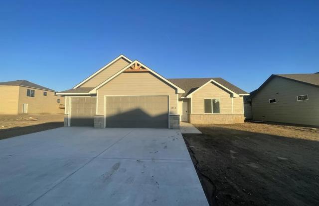 Single family slab home with three car garage. This home is 4 bedrooms, three bathrooms open floor plan. Zero entry home. Mowing included.