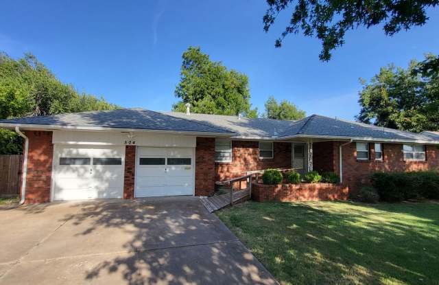 Remodeled 3 bedroom 2 bathroom house with 2 car garage and fenced yard