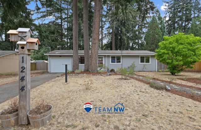 MOVE IN READY NOW! Charming Updated Rambler with RV Parking, Large Fenced Yard & Optional Chicken Coop!