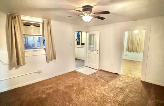 Charming 1BD/1BA Avenues Duplex with Screened Porch  Large Backyard—Utilities Included