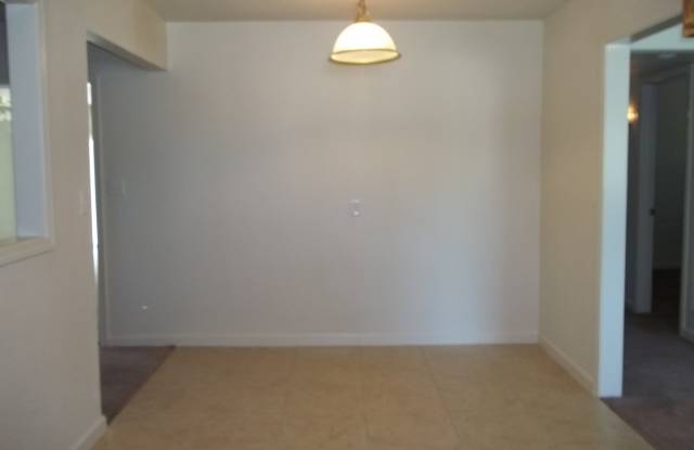 Nice home featuring a nice floor plan with a large living room and family room, updated amenities + close to schools, shopping and HWY 168