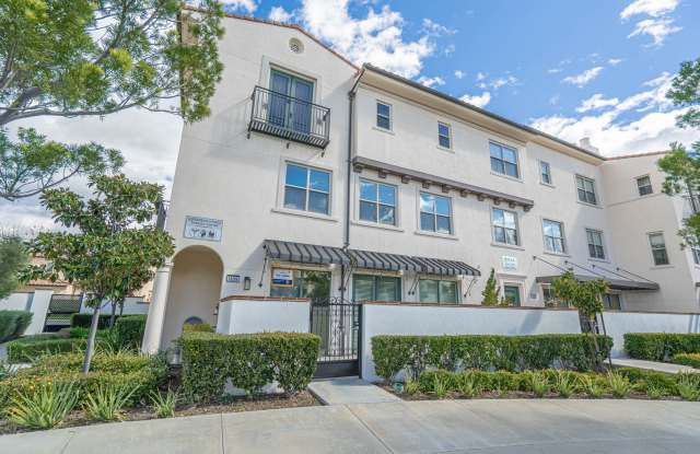 Unique 4-Bedroom, 3-story Live/Work Townhouse in the lushly landscaped Villa Metro Community!