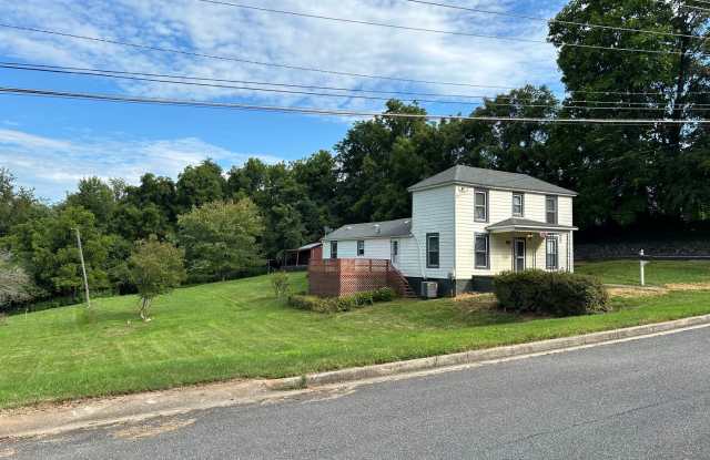 4BR, 1BA SFH on Large Lot