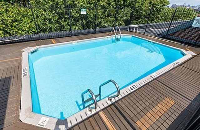 Photo of Modern 2-bed, 1.5-bath condo on the 4th floor of The Amory House