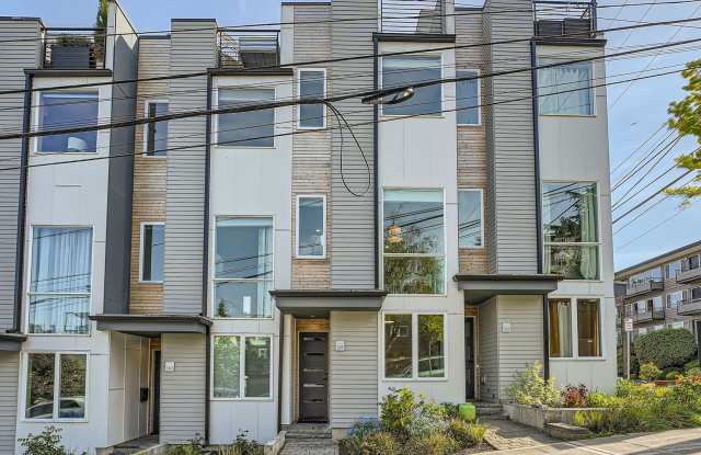 Modern stylings and cutting-edge conveniences meet in this spectacular Queen Anne hillside location!