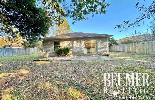 7 mo Lease Charming Home with Spacious Backyard and Modern Upgrades Near NAS Pensacola