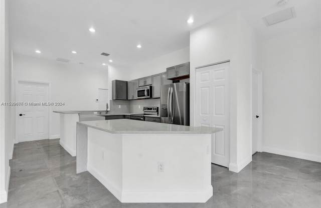 108 NW 1st Ave