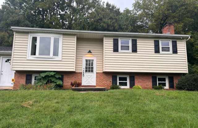 Photo of Spacious 4-Bedroom Home with Large Yard  Garage!