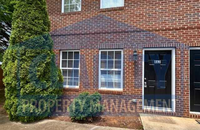Brick Townhouse w/ 2 Bedrooms, 1.5 Bath with a Spacious Living Room!