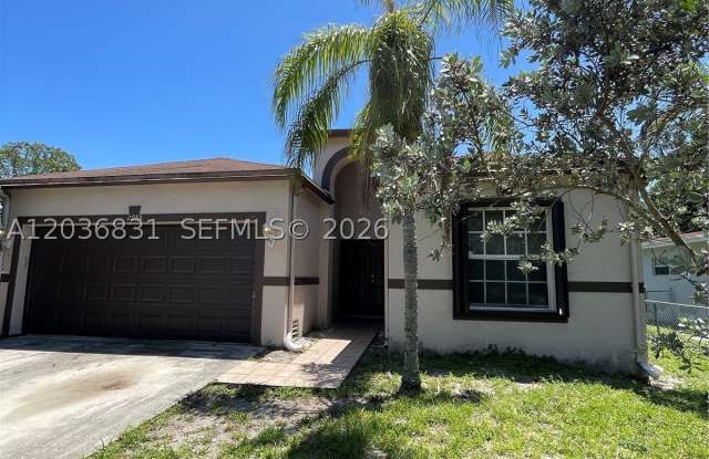 2988 NW 7TH CT