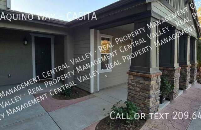 718 W Aquino Way