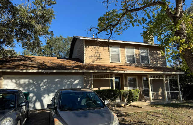 Welcome home to 10022 Windburn Trail!